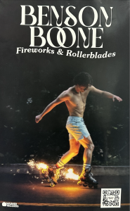 Benson Boone rollerblades with fireworks on the cover of his album. Photo by Claire Baek.